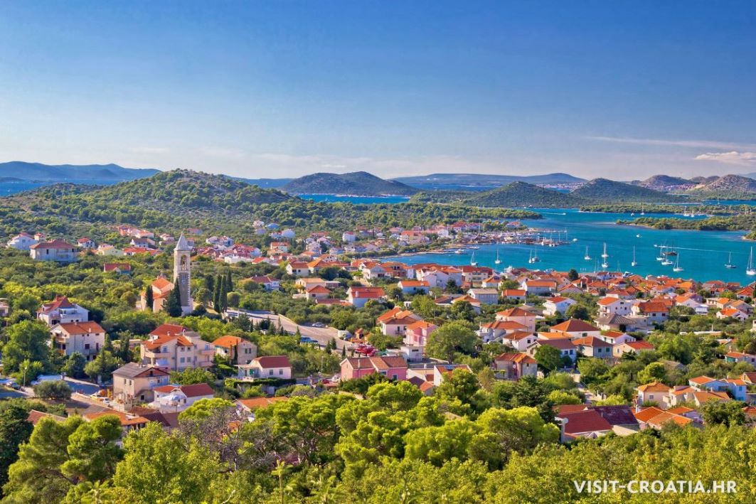 Panorama view of the place Murter, showing the church and the archipelago with many islands.